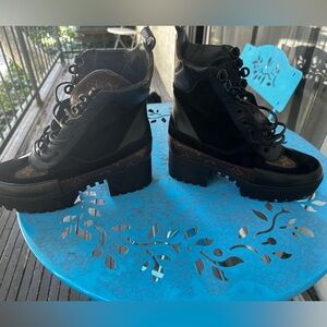 Louis Vuitton combat boots - never worn outside.